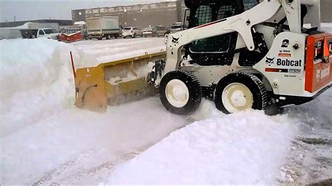 moving snow with a mini skid steer|skid steer for plowing.